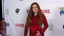 Vella attends the 8th Annual Winter Wonderland Toys for Tots charity event red carpet in Los Angeles