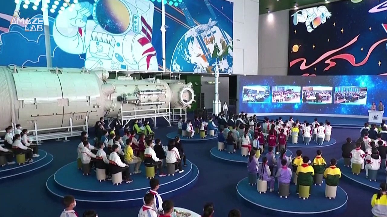 Chinese Astronauts Teach Kids From Aboard Their...