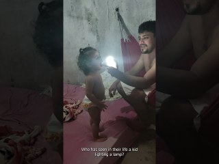 Little Girl Lights Bulbs Using Tongue