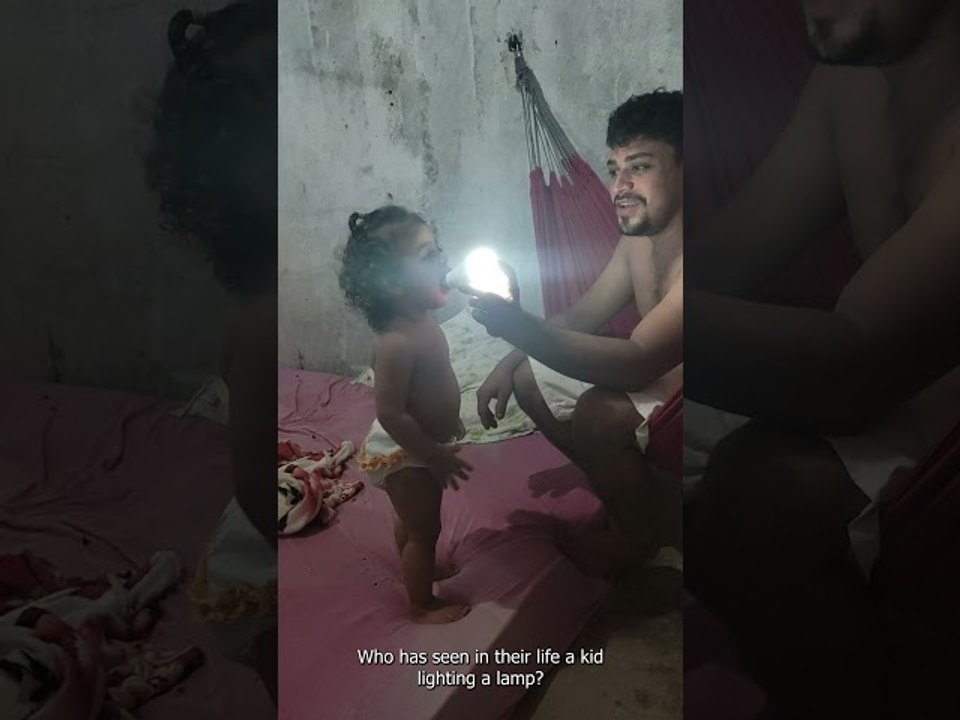 Little Girl Lights Bulbs Using Tongue