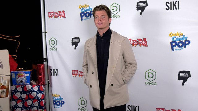 Jamie Miller attends the 8th Annual Winter Wonderland Toys for Tots charity event red carpet in Los Angeles