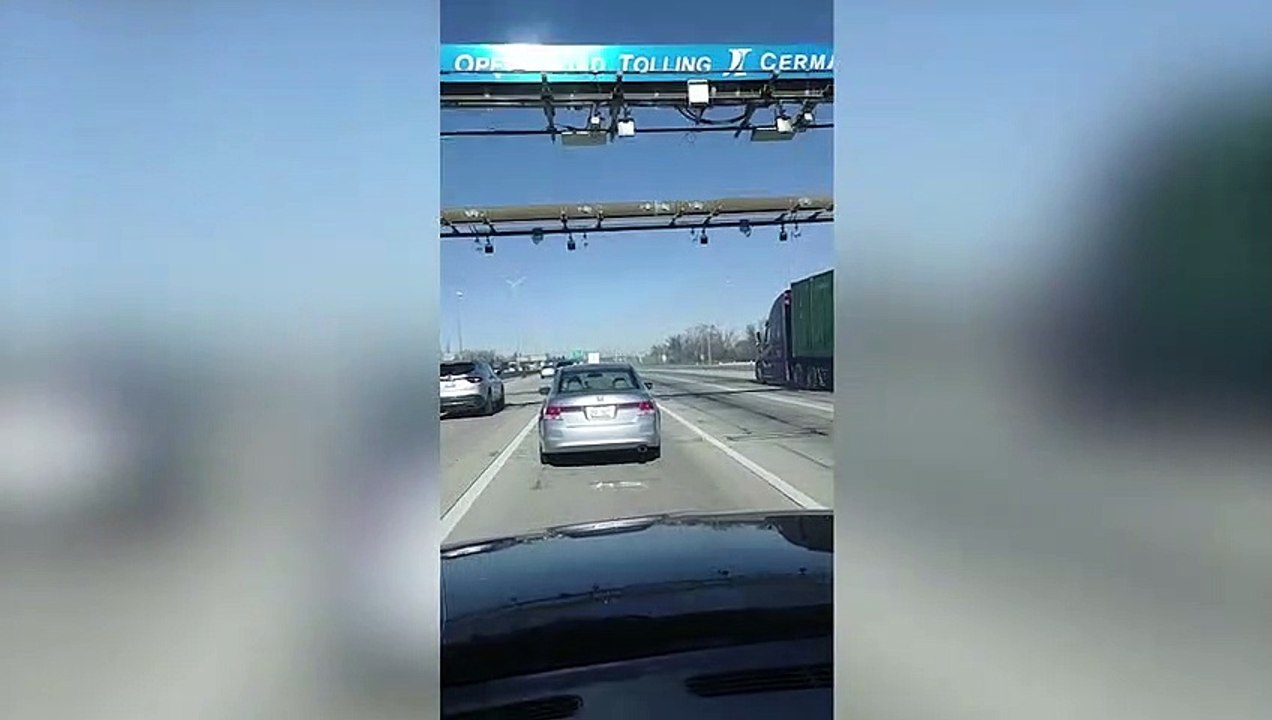 TRUCKING HELL - Bizarre moment a truck dragged...