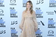 Olivia Wilde feels 'happier than ever'