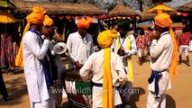 Folk musicians compiling beats with traditional instruments at Surajkund Mela