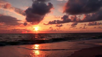 Beach sunset with waves