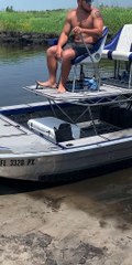 Sunken Airboat Gets Towed to Shore