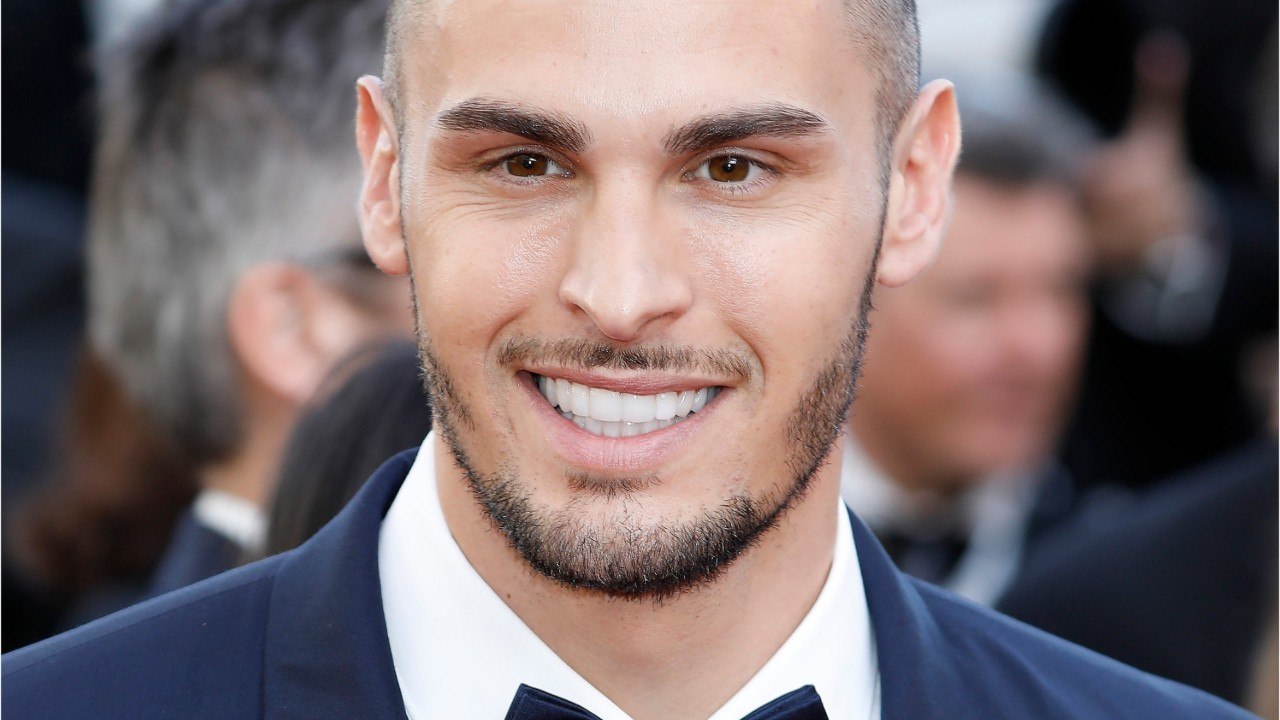 VOICI - Baptiste Giabiconi affiche son corps de rêve et dévoile le secret pour le séduire