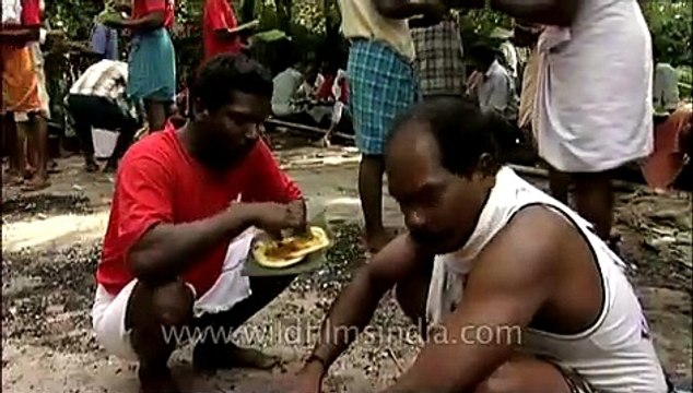South Indian feast being served on banana leaves