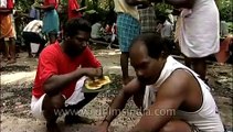 South Indian feast being served on banana leaves