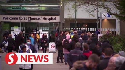 UK braces itself for 'tidal wave of Omicron'