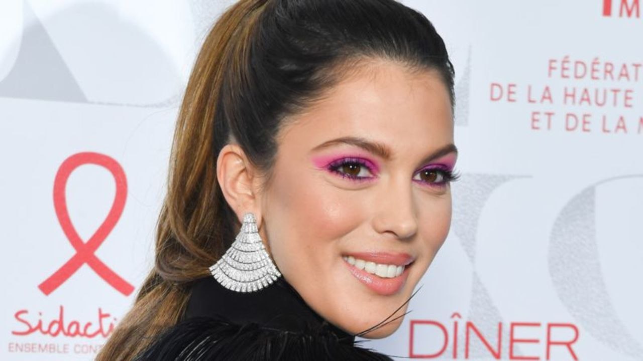 VOICI - Iris Mittenaere en cuir et résille, elle est torride pour le spectacle de Jean-Paul Gaultier