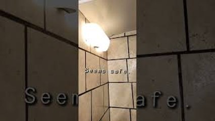 Light Fixture Found in Shower Stall