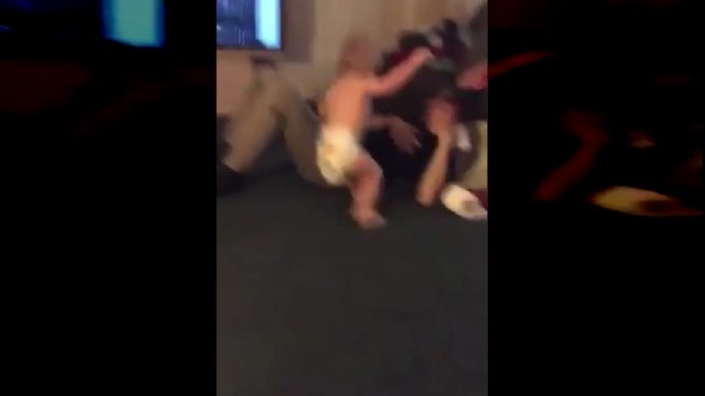 Baby Fakes Out Man with a Slap