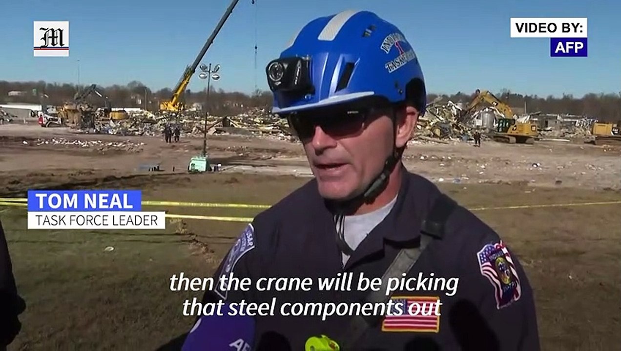 Rescuers search rubble at collapsed candle factory after Kentucky