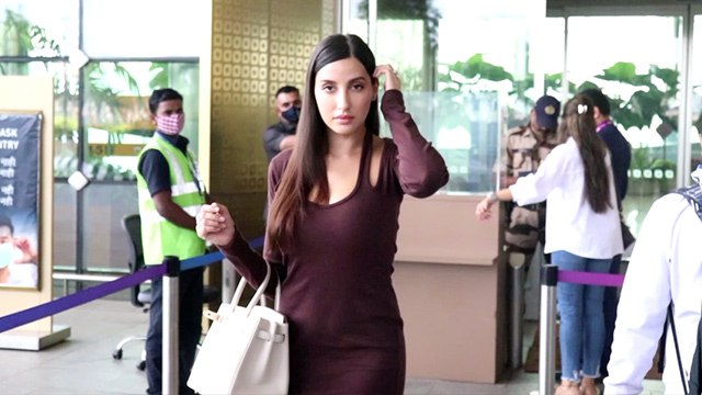 Actress Nora Fatehi की टाइट ड्रेस ने कराया शर्मिंदा, Mumbai Airport पर दिखीं|FilmiBeat