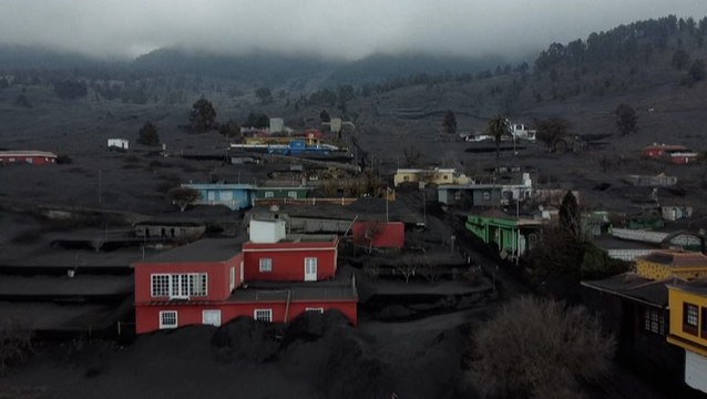 Dozens of homes buried under volcanic ash in Spain