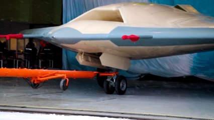 Russia Rolls Out Flying Prototype Of Its New Stealth Combat Drone.mp4