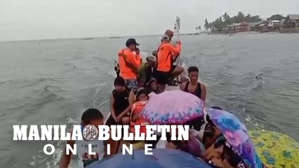 Coast guard evacuates Philippine islanders by boat ahead of typhoon