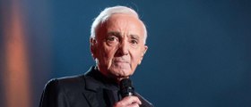 GALA VIDEO - Charles Aznavour : absent aux obsèques de Johnny Hallyday, comment il lui a rendu hommage à sa façon