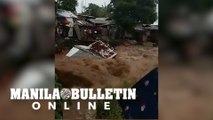 A house in Cagayan de Oro was swept by a strong river current due to 'Odette'