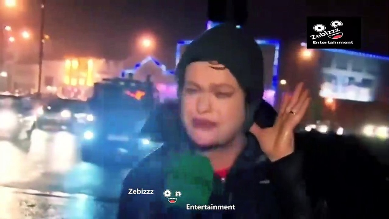 she is reporting or singning