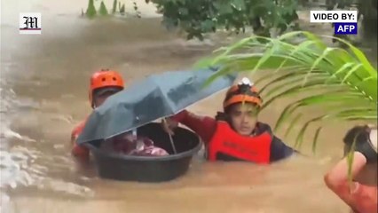 Baby floated to safety in tub amid floods in Philippines