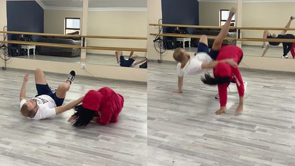 'Dance partners (literally) crash on the floor after partner flip attempt goes wrong '