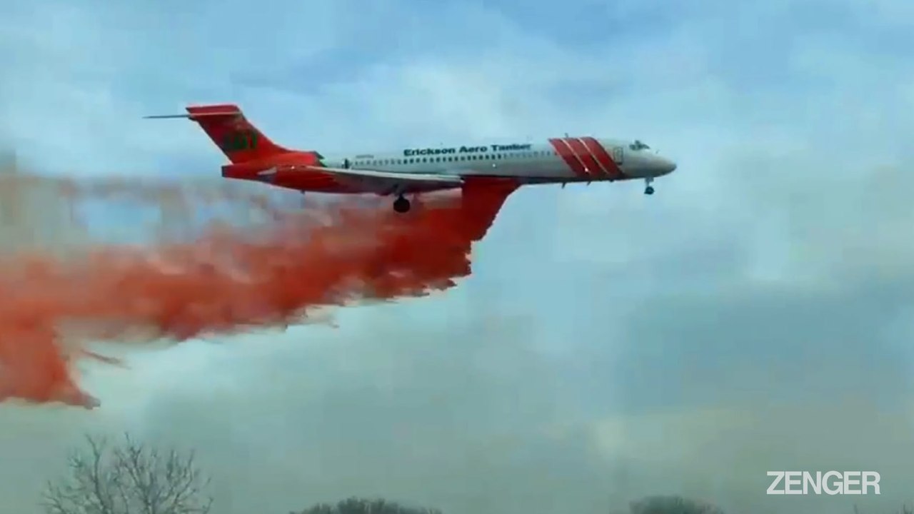 Firefighters Bomb Blaze With Flame Retardant.mp4