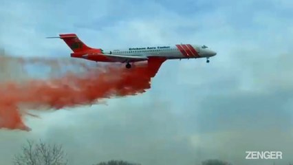 Firefighters Bomb Blaze With Flame Retardant.mp4
