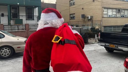 NYC’s “Sandy Claus” Delivers Presents To Children In Need