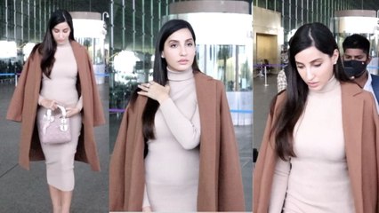 Nora Fatehi कंधों पर कोट को लटकाकर दिखी Tight dress में ऐसे; Watch video | FilmiBeat