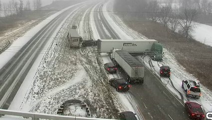 Truck jackknifes amid icy road conditions