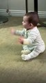 Cute baby clapping For Fun And Happy Of Its Life Moment