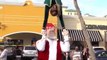 Performers Dressed as Santa and Elf Perform Acrobatic Tricks For Audience