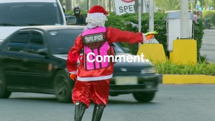 In Manila regelt der Weihnachtsmann den Verkehr und tanzt dabei