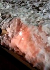 Sparkler Stays Lit In Snow
