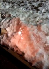 Sparkler Stays Lit In Snow