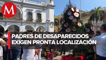 En Veracruz, colocan 'árbol del dolor' con rostros de desaparecidos