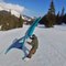 Guy Does Wing Snowboarding At Scenic Mountains