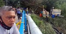 Kerja-kerja pengepaman air banjir di Taman Sri Muda, Seksyen 25, Shah Alam ke dalam Sungai Klang