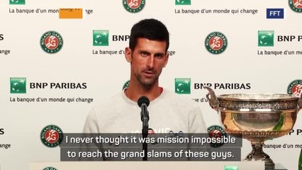 Tải video: 2021 Rewind: Djokovic joins Federer and Nadal on record 20 grand slams