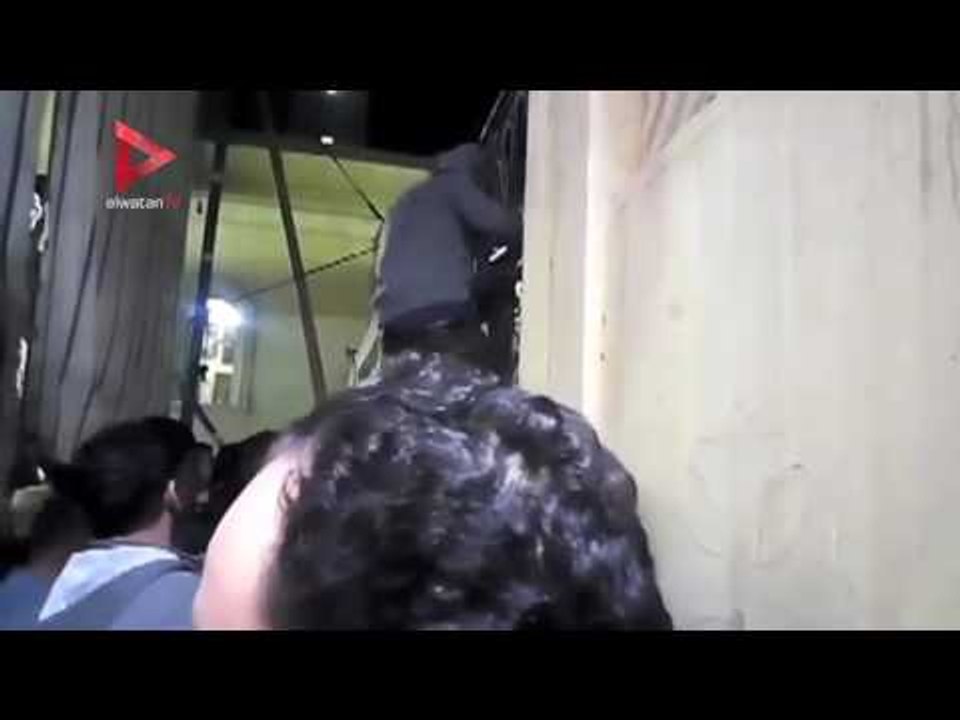 الأهالي يضبطون متسللين على سور"مارجرجس" بطنطا لحضور جنازة الشهداء