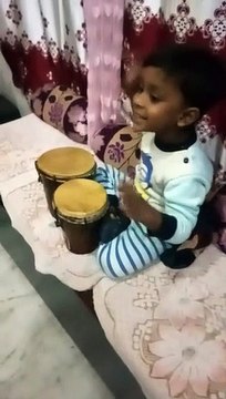 Enoch mark Ronald Singing and playing instruments.