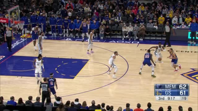 Curry knocks down deep three while falling