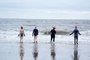 Swimmers brave the cold to take a Christmas day dip