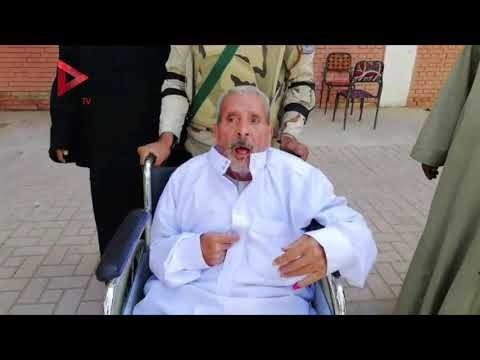 حسن يدلي بصوته بالشرابية على كرسي متحرك