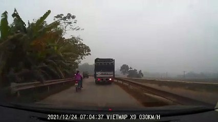 Rider Tries to Make a Tight Squeeze