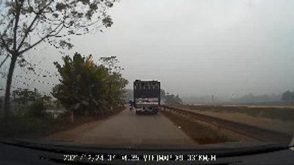 Rider Tries to Make a Tight Squeeze