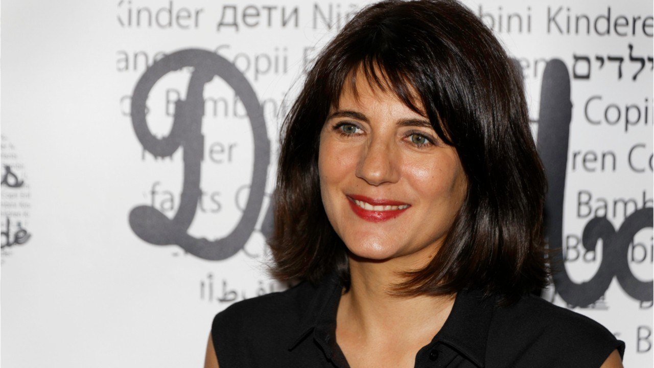 FEMME ACTUELLE - Estelle Denis et Raymond Domenech : leur fils Merlin a 14 ans... et il a bien changé !