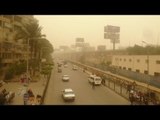 عاصفة ترابية تضرب القاهرة والجيزة.. ومواطنون يواجهونها بالكمامات